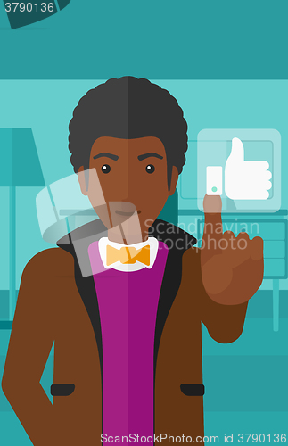 Image of Man pressing like button.