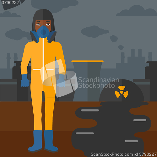 Image of Woman in protective chemical suit.