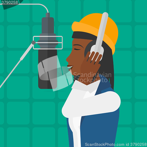 Image of Singer making record. 