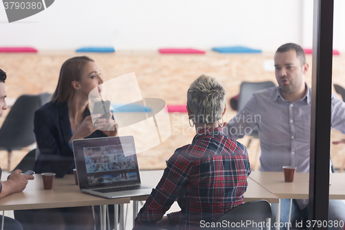 Image of startup business team on meeting at modern office