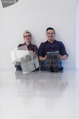 Image of startup business, couple working on laptop computer at office