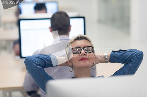 Image of startup business, woman  working on desktop computer