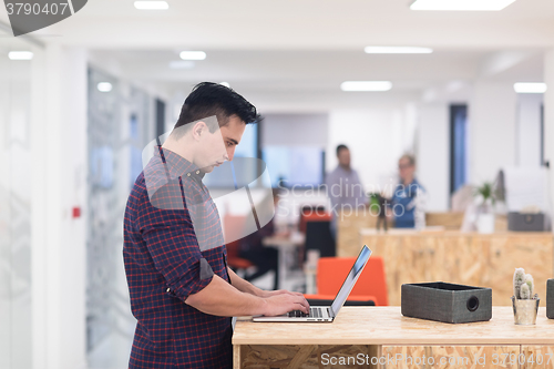 Image of startup business, young  man portrait at modern office