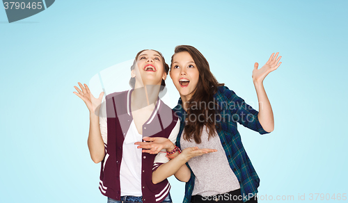 Image of happy smiling pretty teenage girls having fun