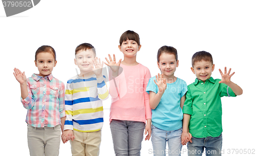 Image of happy smiling little children holding hands