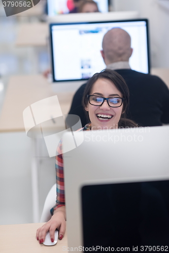 Image of startup business, woman  working on desktop computer