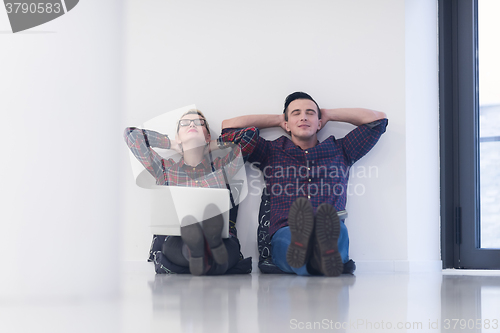 Image of startup business, couple working on laptop computer at office