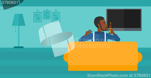 Image of Man watching TV.