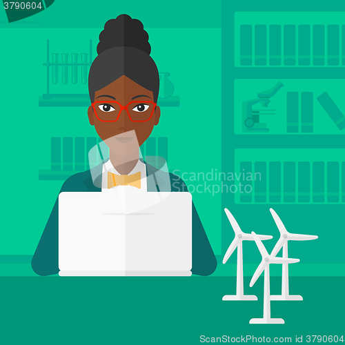 Image of Woman working at laptop. 