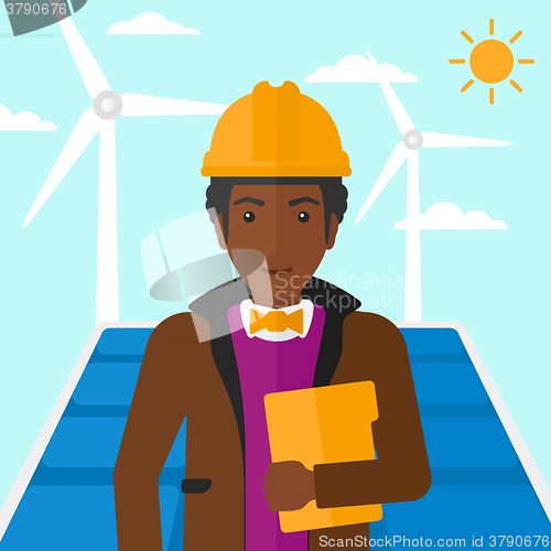 Image of Man holding tablet computer.