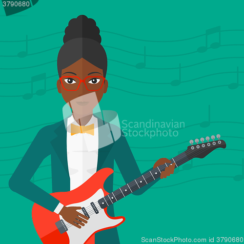 Image of Musician playing electric guitar.