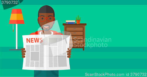 Image of Reporter reading newspaper.