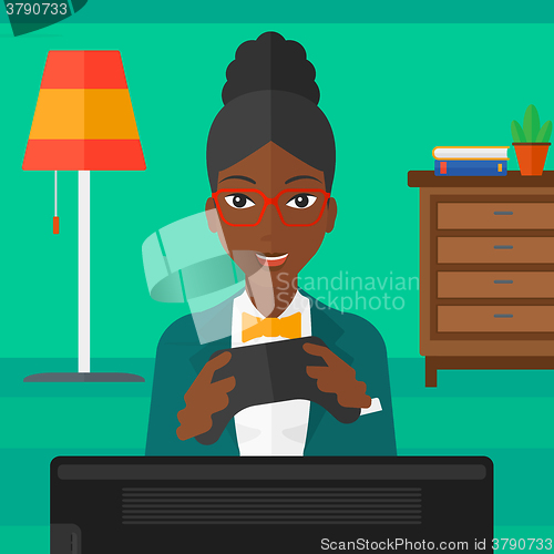 Image of Woman playing video game.