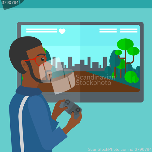 Image of Man playing video game.