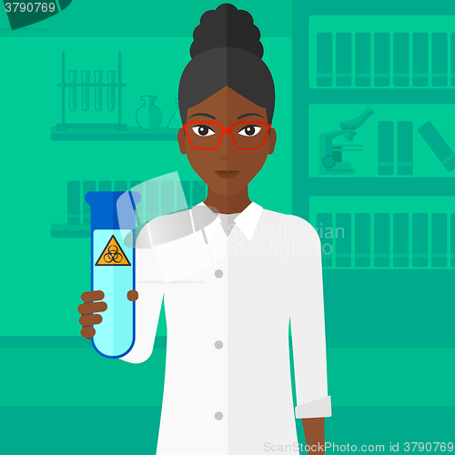 Image of Laboratory assistant with test tube.