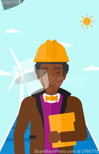 Image of Man holding tablet computer.