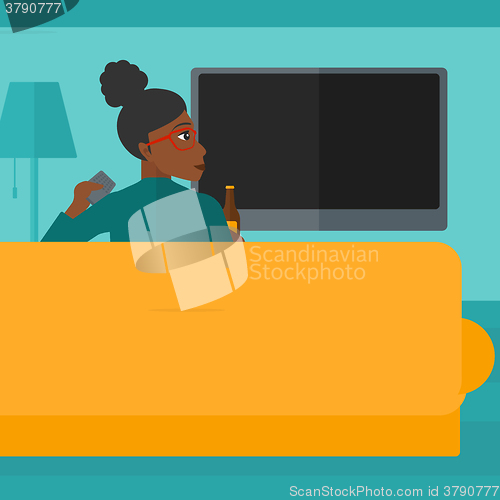 Image of Woman watching TV.