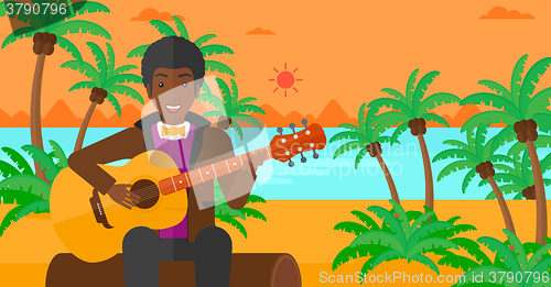 Image of Man playing guitar.