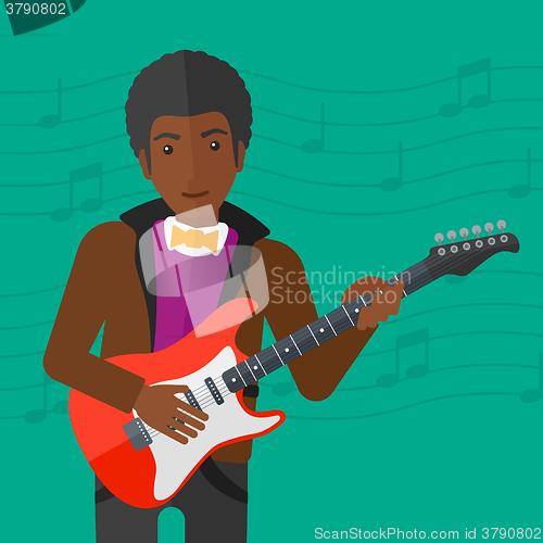 Image of Musician playing electric guitar.