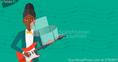 Image of Musician playing electric guitar.