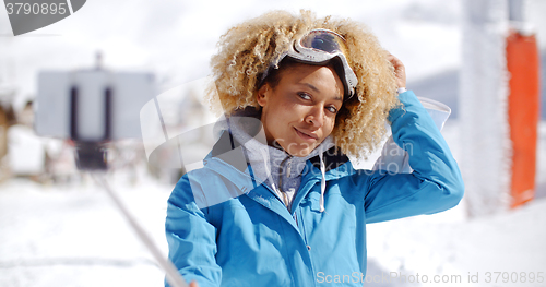 Image of Attractive young woman with a modern afro hairdo