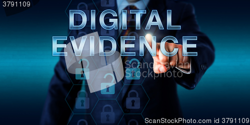 Image of Cyber Investigator Touching DIGITAL EVIDENCE\r