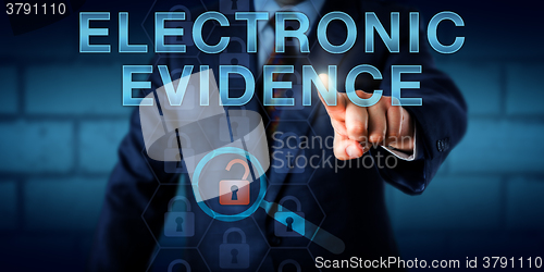 Image of Forensics Expert Pressing ELECTRONIC EVIDENCE