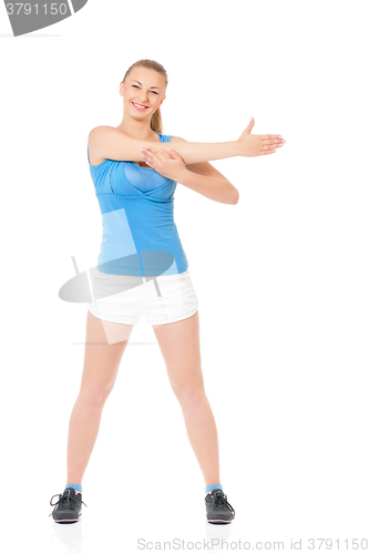 Image of Happy woman doing fitness exercise