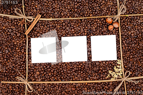 Image of Empty paper on roasted coffee beans