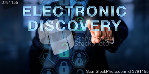 Image of Forensic Examiner Pressing ELECTRONIC DISCOVERY