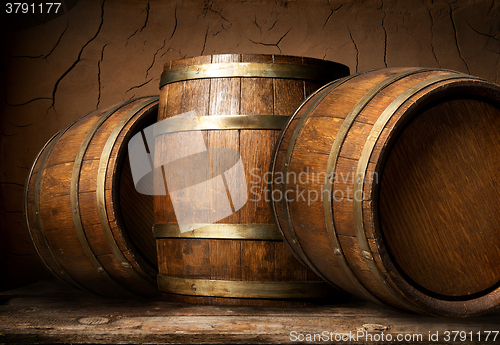 Image of Wooden barrels in cellar