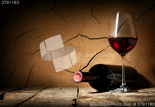 Image of Wine and cracked wall