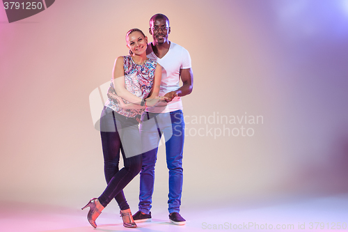 Image of Young couple, studio shot 