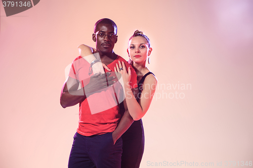 Image of The young cool black man and white woman