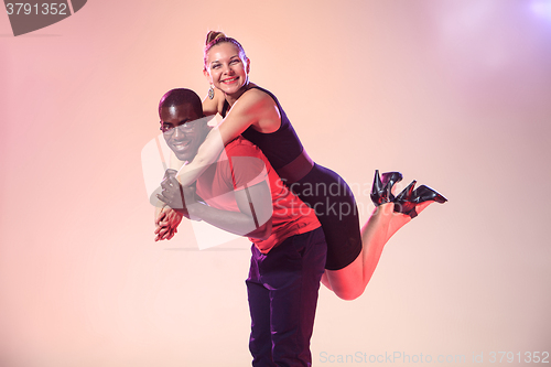 Image of The young cool black man and white woman