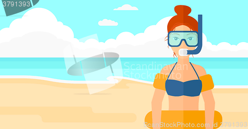 Image of Woman with swimming equipment.