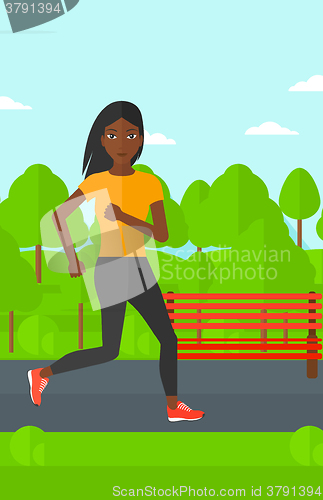 Image of Sportive woman jogging.