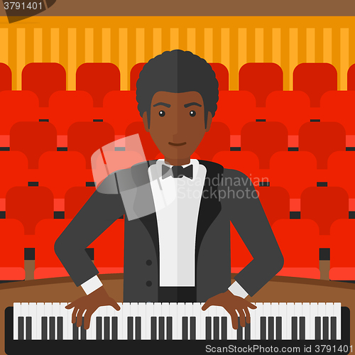 Image of Man playing piano.