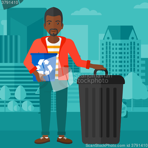 Image of Man with recycle bins.