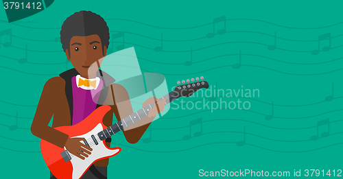 Image of Musician playing electric guitar.