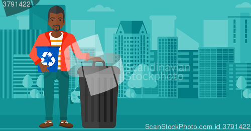 Image of Man with recycle bins.