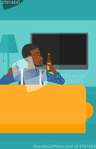 Image of Man watching TV.