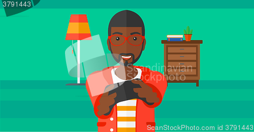 Image of Man playing video game.