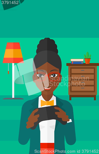 Image of Woman playing video game.