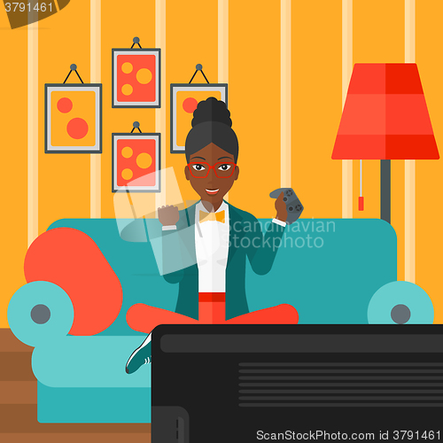 Image of Woman playing video game.