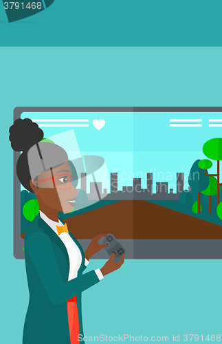 Image of Woman playing video game.