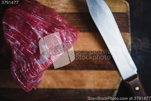 Image of fresh meat beef on dark background