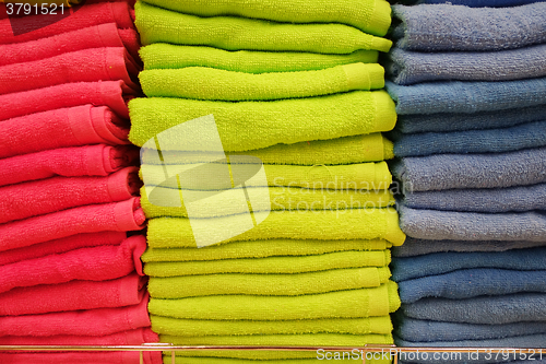 Image of Stacks of multicolored towels  