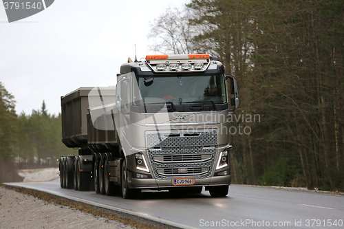 Image of Bronze Volvo FH16 Combination Truck Hauls Limestone