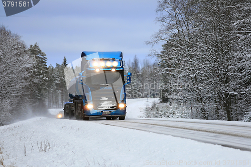Image of Blue Scania Tank Truck on Blue Winter Road